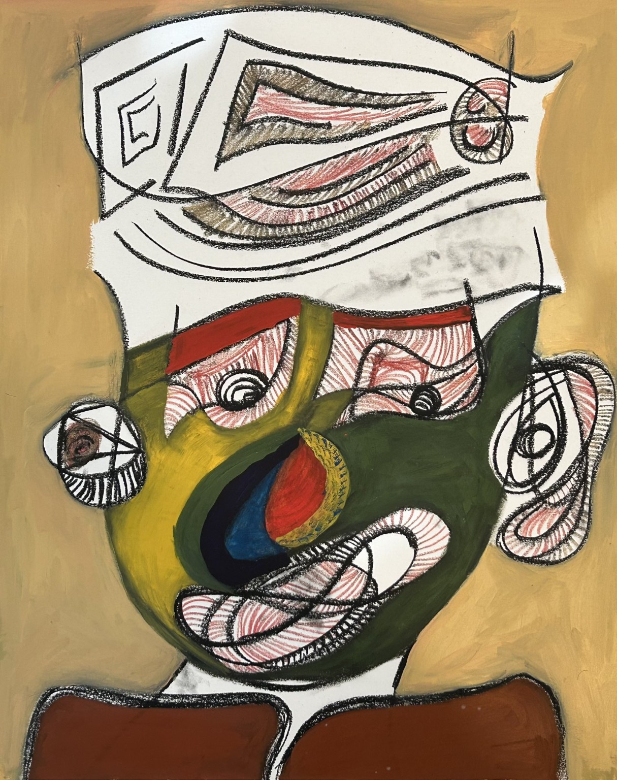 Green face with large eyes and a patterned white head covering