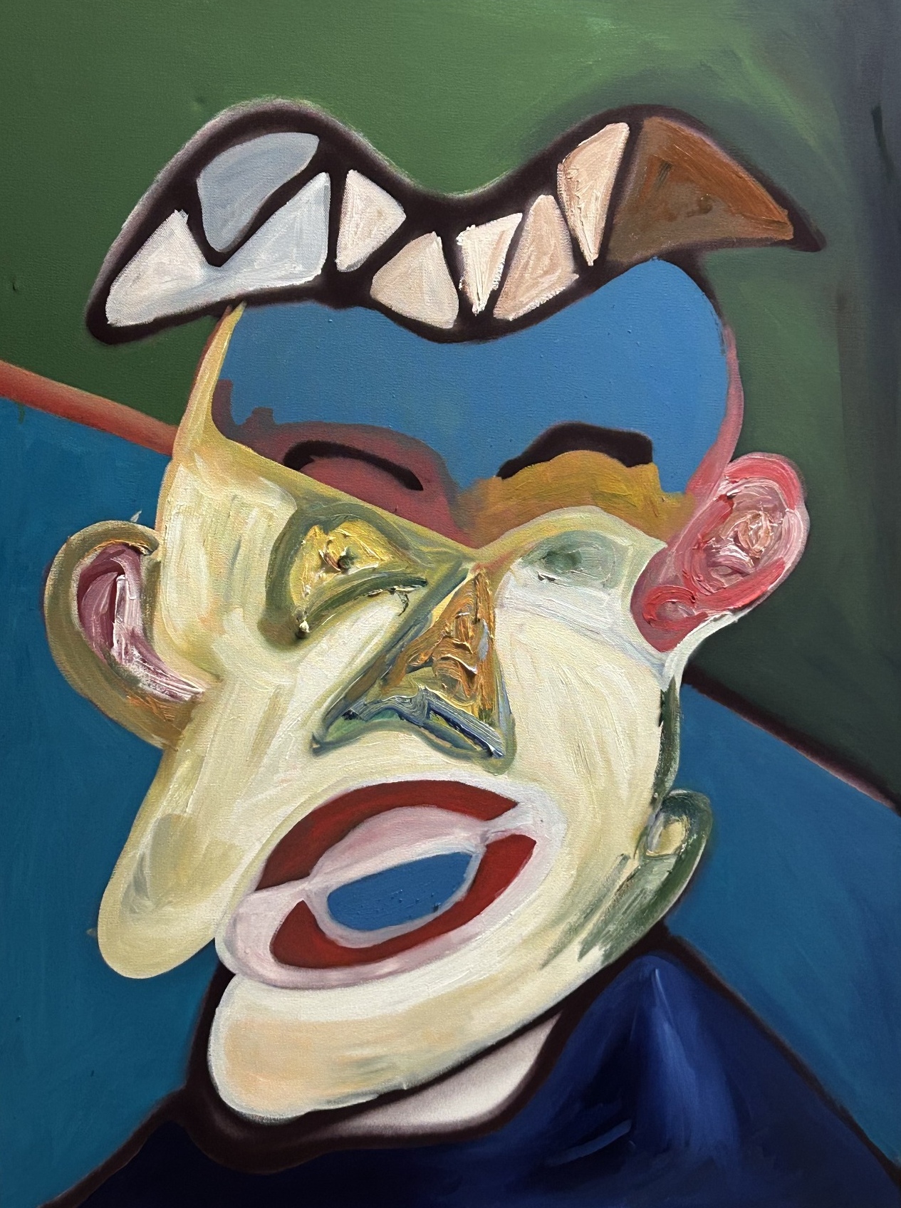 Pale face with a segmented white form against blue and green
